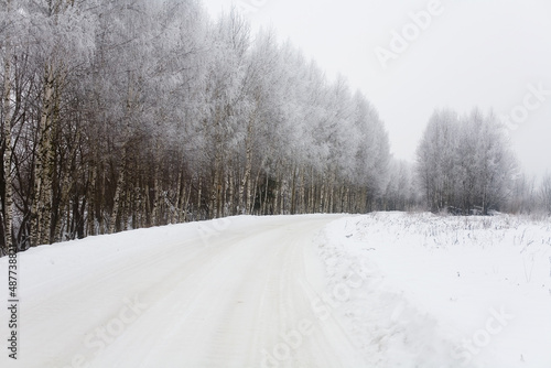 Russian rural road covered with white snow.