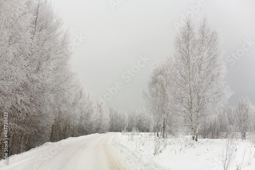 Russian rural road covered with white snow.