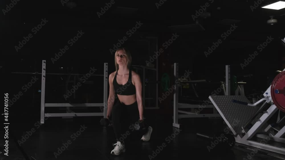 Back lunges with dumbbells in hand