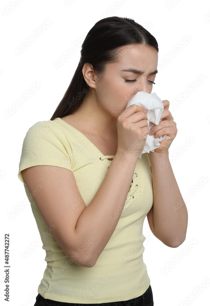 Sick young woman sneezing in tissue on white background. Cold symptoms Sick young woman sneezing in tissue on white background. Cold symptoms