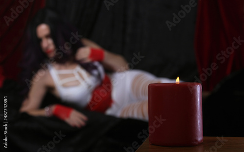 Red Candle With Woman wearing white and red retro clothing
