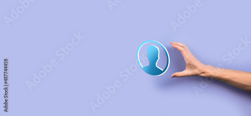 Businessman holding on hand icon of user man,woman 3D style. Internet icons interface foreground. global network media concept. © Ivan