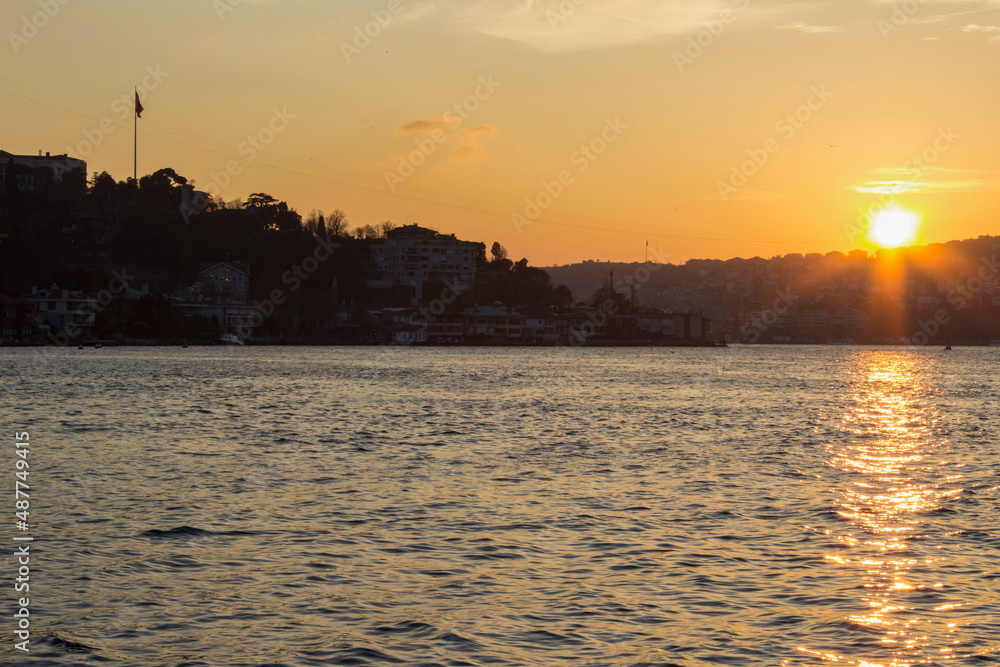 The sunset in city with together sea Anadoluhisari Istanbul, turkey