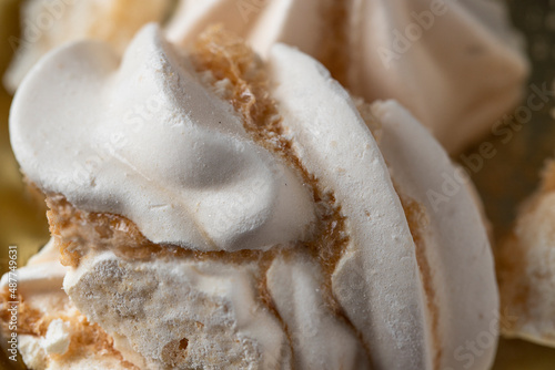 Close up of French Meringue sweet texture made with whipped eggs .