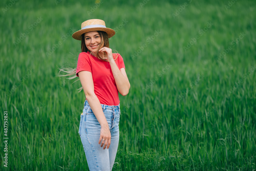 Woman in hat with long hair is happy, beautiful active free on s