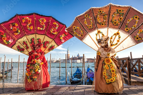 Colorful carnival masks at a traditional festival in Venice, Italy photo