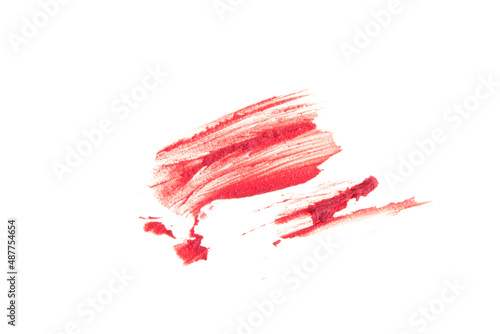 Textured lipstick smear. The pink color is highlighted on an isolated white background. An element for beauty cosmetic design. High quality photo