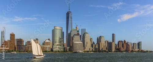  New York,NY USA  august 09 2016 panoramic photo of new york in color with sailboat Manhattan © Andrea