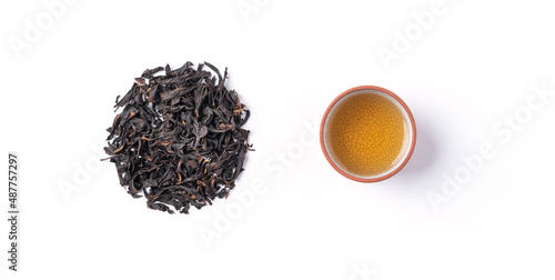 Obraz na plátne Top view design concept of fresh black tea and leaves in Taiwan.