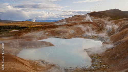 a soaring hot spring in the form of a small lake in Iceland © sanbeliaev