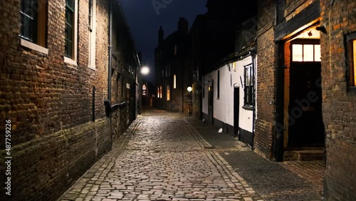 Night walk along the cobbled streets of King's Lynn, a port and market town in Norfolk, England, UK photo