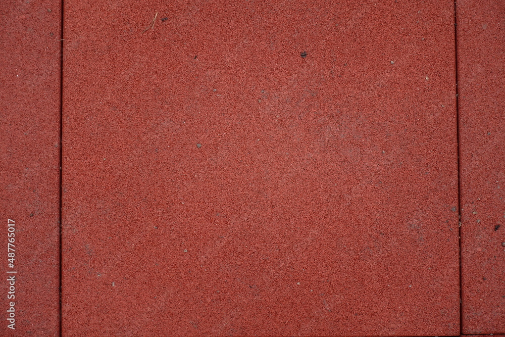 Fototapeta premium Close view of brownish red EPDM synthetic rubber floor