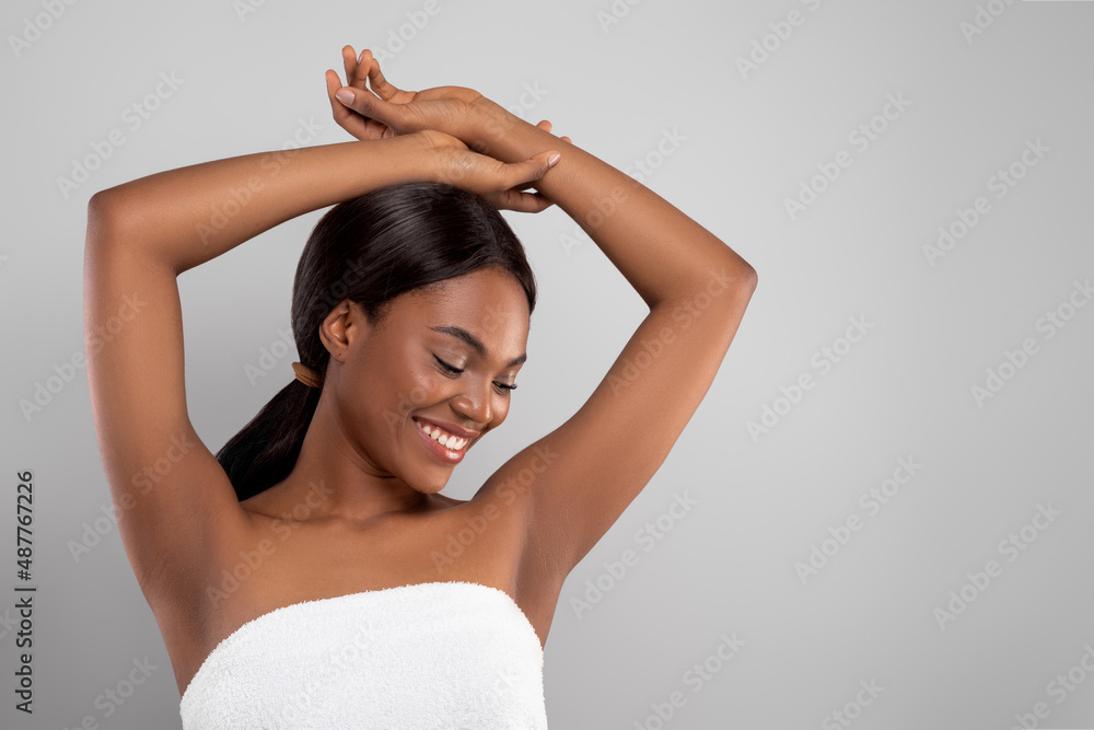 Armpit Depilation Concept. Happy Black Lady Looking At Her Smooth Underarms Armpit Depilation Concept. Happy Black Lady Looking At Her Smooth Underarms