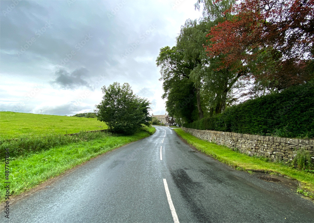 Looking along the, Clitheroe to Skipton road, on a wet day near, Gargrave, Skipton, UK Looking along the, Clitheroe to Skipton road, on a wet day near, Gargrave, Skipton, UK