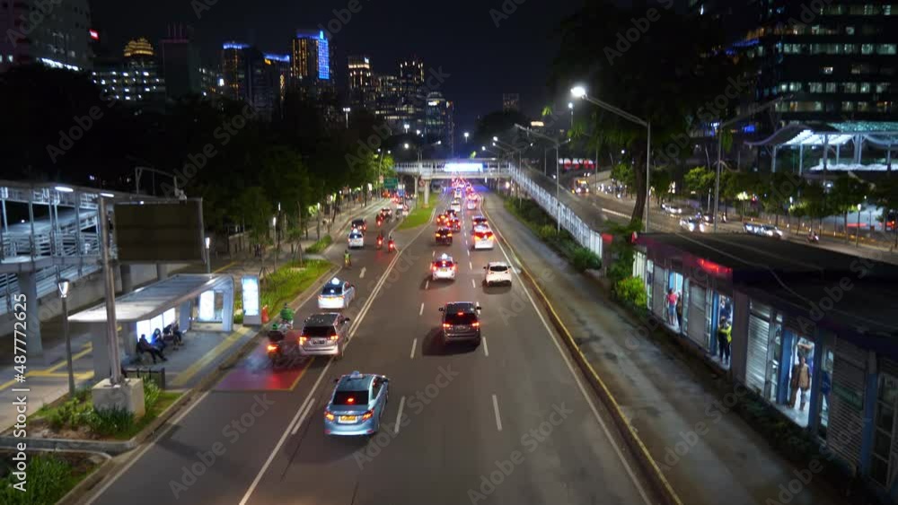 night time illumination jakarta city downtown traffic street road bridge top panorama 4k indonesia night time illumination jakarta city downtown traffic street road bridge top panorama 4k indonesia