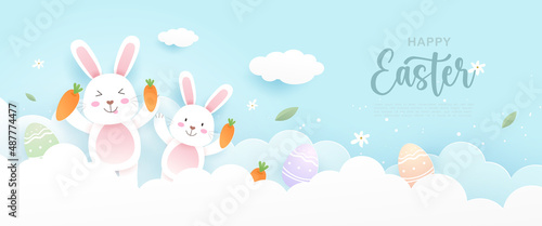 Happy Easter with cute bunny or rabbit, easter eggs, carrot and festive elements on the blue sky in paper cut style. Vector illustration
