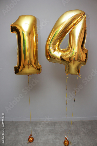 birthday balloons with golden numbers
