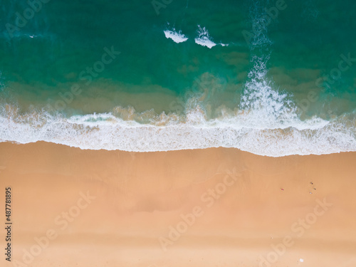 Nature and travel concept video beach sea Aerial view Top-down shot on drone camera high quality. Tropical sea beach in island on 2022. Location: Phuket Thailand