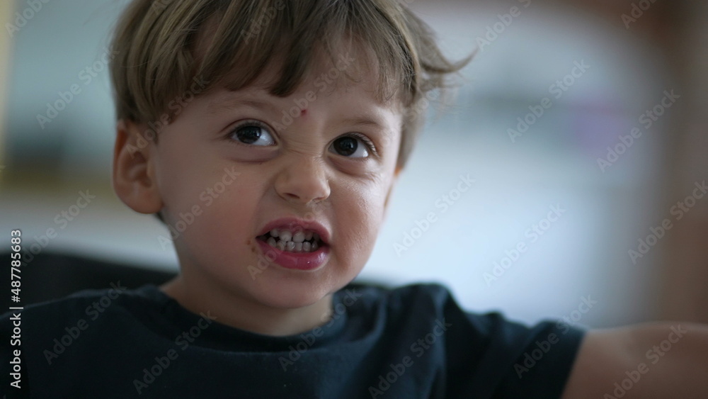 One annoyed little boy screaming and yelling upset child One annoyed little boy screaming and yelling upset child