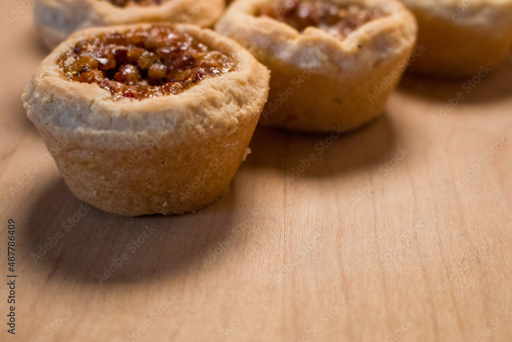 delicious mini pecan pie sweet desert dinner closeup food display miniature background delicious mini pecan pie sweet desert dinner closeup food display miniature background
