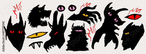 Valokuva Funny creepy set of black monster heads and eyes in hand drawn doodle style isolated on white background