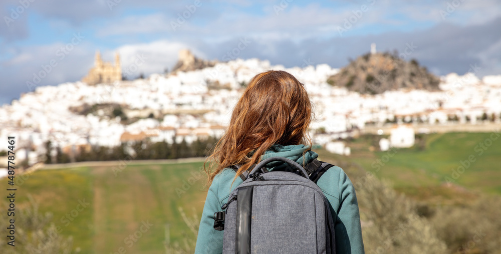 woman and backpack in Andalusia village - Olvera