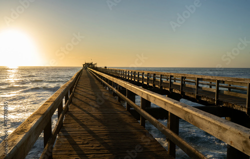 Old long wooden jetty at sunset © fivepointsix