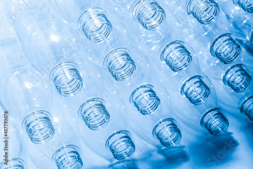 Bottling plant - Plastic bottles. Abstract background of plastic bottles. Selective focus