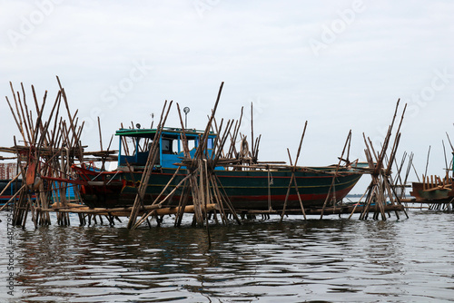 ship under repair at the floating village of Andoung Tuek