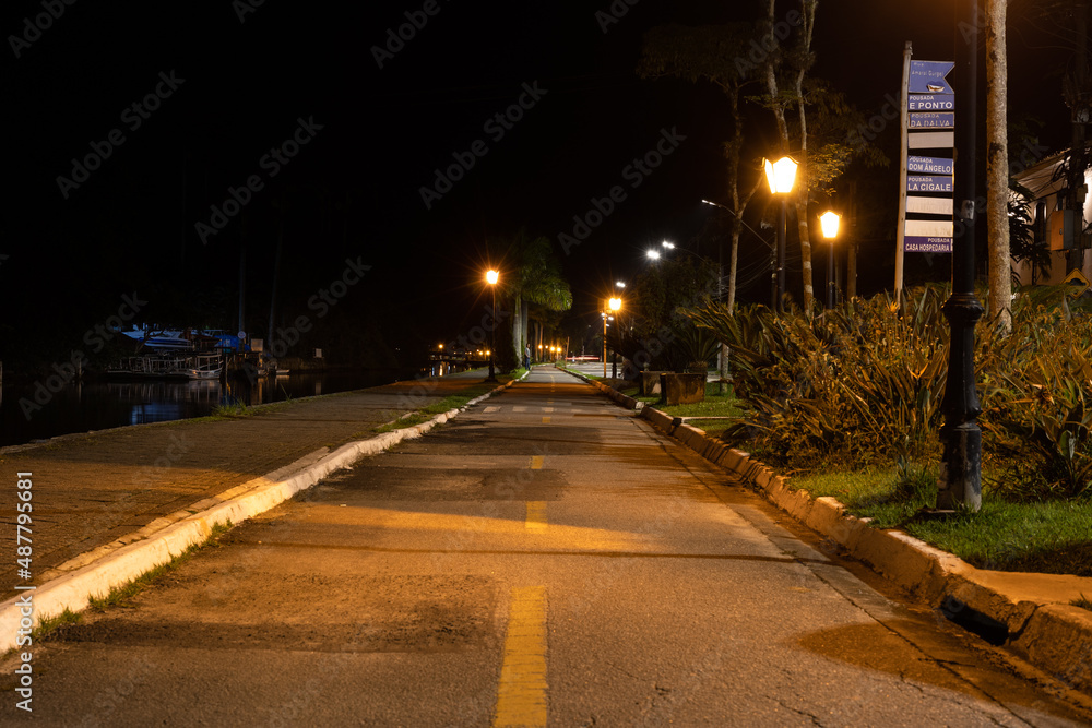 bike path at night illuminated by public light