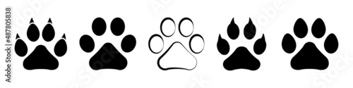 Different animal paw. Paw prints silhouette. Footprints dog and cat with claw. Imprint legs isolated on white background. Vector illustration.