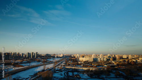 Suburb of a big city. City block from the height of the flight. Winter cityscape. Aerial photography. © f2014vad