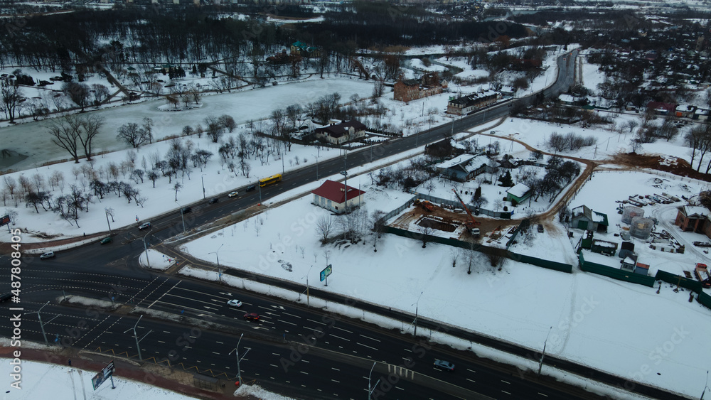 Suburb of a big city. City block from the height of the flight. Winter cityscape. Aerial photography. Suburb of a big city. City block from the height of the flight. Winter cityscape. Aerial photography.