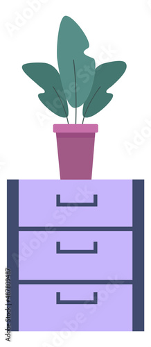 Three drawer cabinet with houseplant. Storage wooden furniture