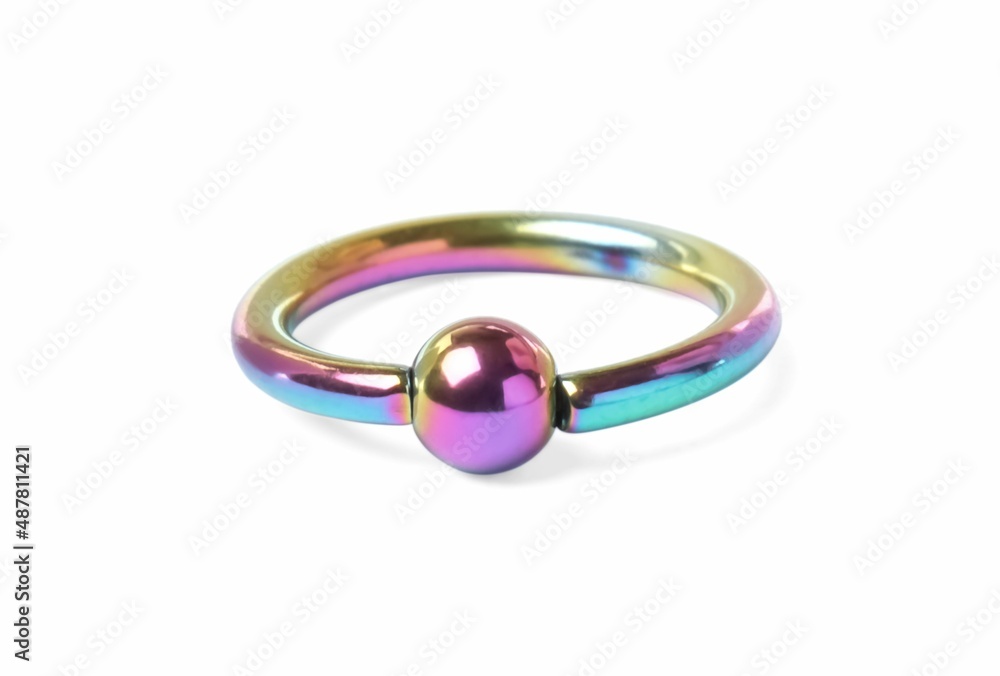 Piercing jewelry. Captive bead ring isolated on white Piercing jewelry. Captive bead ring isolated on white