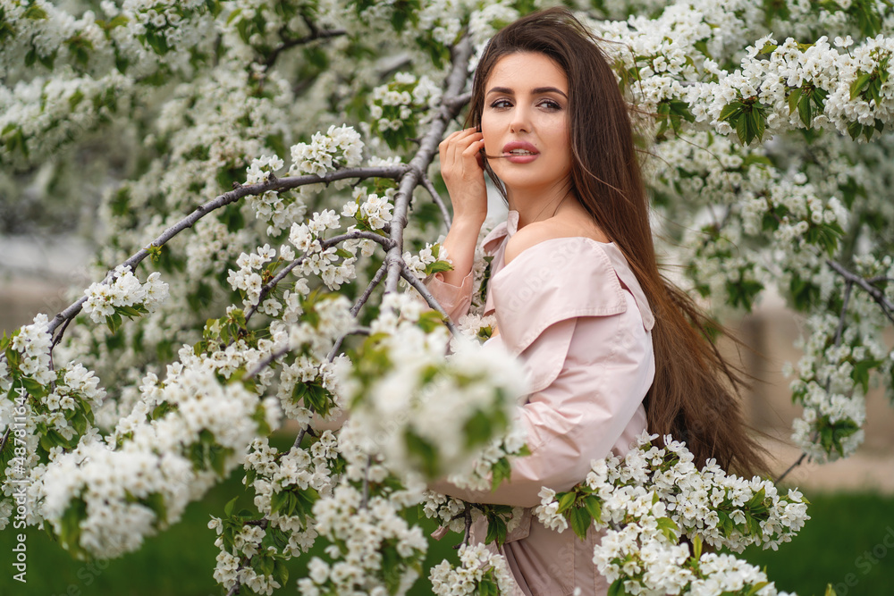 Portrait of the beautiful sexy woman with flying dark hair. Outdoors portrait Portrait of the beautiful sexy woman with flying dark hair. Outdoors portrait