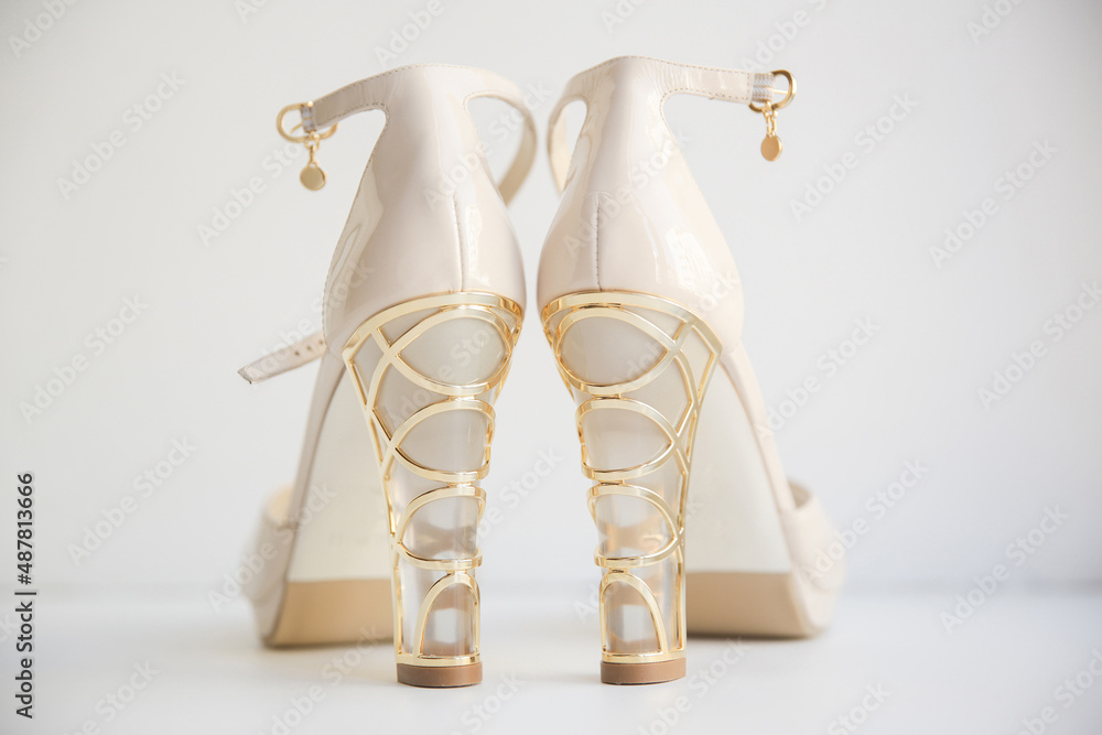 Pair of wedding shoes with decorated heels Pair of wedding shoes with decorated heels