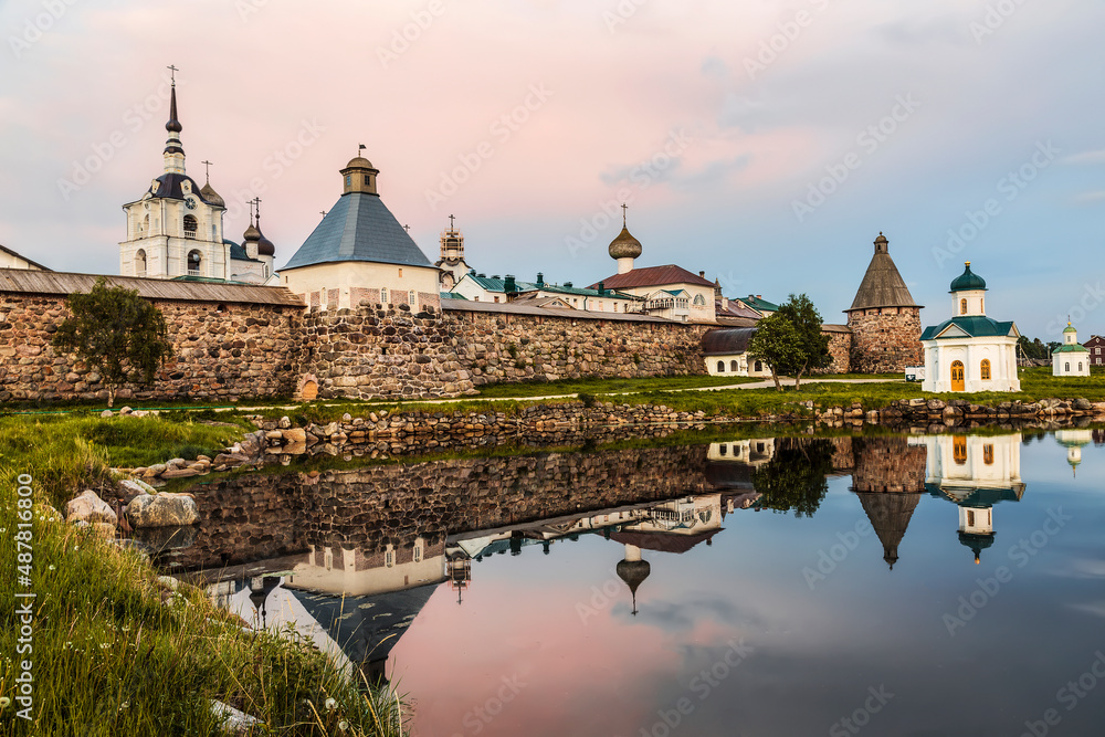 Spaso-Preobrazhensky the Solovetsky Stavropegial monastery on Bolshoi Solovetsky island in the White sea at sunset. Arkhangelsk region, Russia