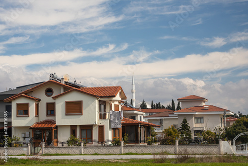 Wallpaper Mural Colorful Turkish streets with low houses, barrels of hot water on the roof and solar panels, city mosque and hotels Torontodigital.ca