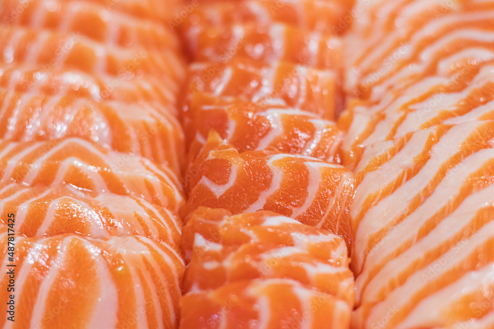 close-up salmon sashimi background. selective focus. close-up salmon sashimi background. selective focus.