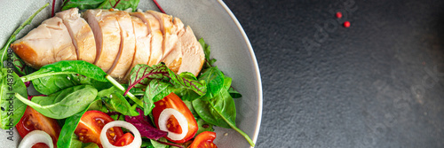 Canvas Print easter salad chicken breast with vegetables tomato, onion, green lettuce mix lea