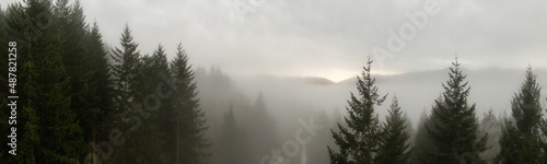 Aerial Panoramic View of Canadian Mountain Landscape covered in fog over Harrison Lake. Winter Season. British Columbia, Canada. Nature Background Panorama © edb3_16