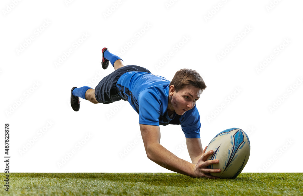In action. Male rugby player catching ball in jump isolated on white
