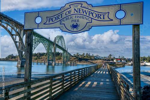 Port of Newport public fishing pier with yaquina bay bridge, at Newport Oregon photo