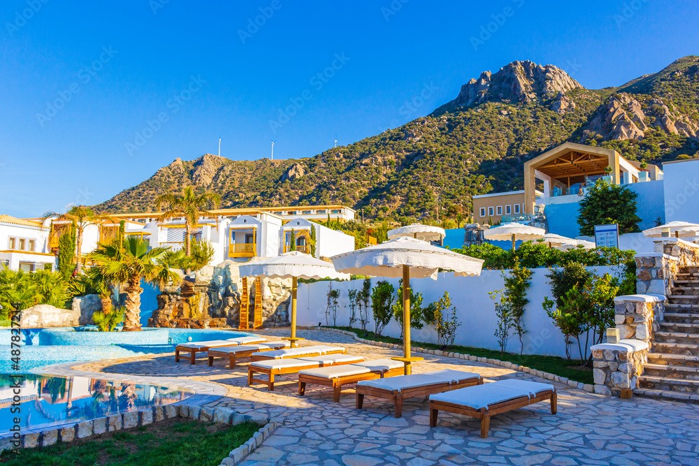 Resorts and beaches with sun loungers and umbrellas Kos Greece.