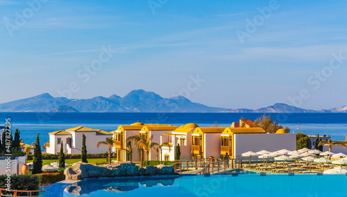 Resorts and beaches with sun loungers and umbrellas Kos Greece.