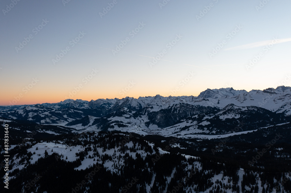 Amazing sunrise with red sky and a beautiful landscape in the wonderful region in Switzerland called Mythenregion. Beautiful mountain called Mythen and an epic sea of fog in the background. Amazing sunrise with red sky and a beautiful landscape in the wonderful region in Switzerland called Mythenregion. Beautiful mountain called Mythen and an epic sea of fog in the background.