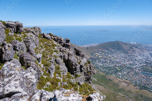 view from the Table Mountain in Cape Town South Africa, view over the ocean, and Lion's Head from Table Mountain Cape Town. 