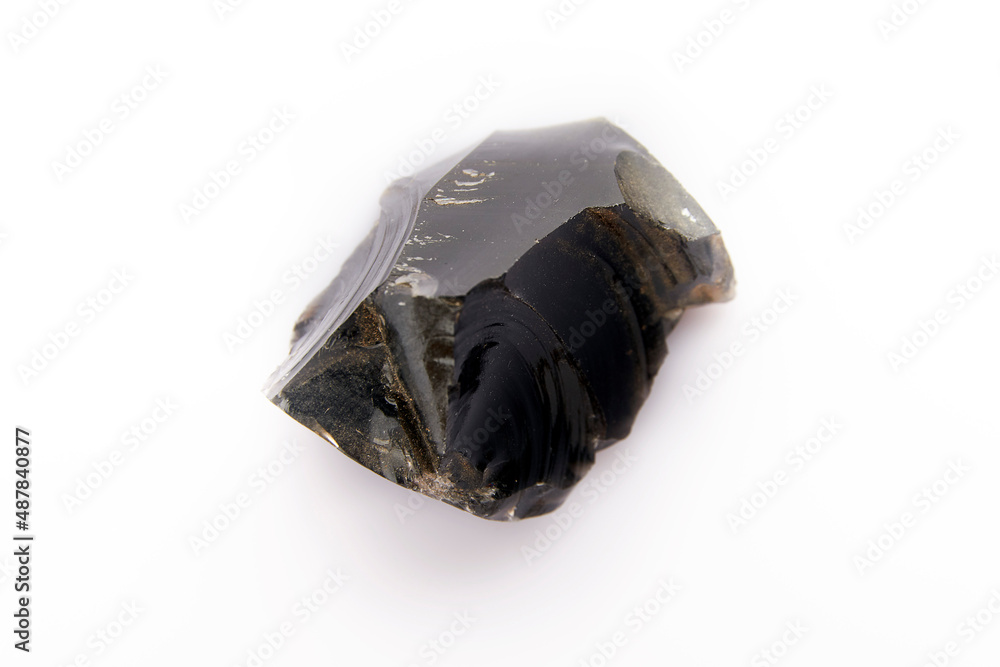 obsidian piece on white background Obsidian, sometimes called volcanic ...