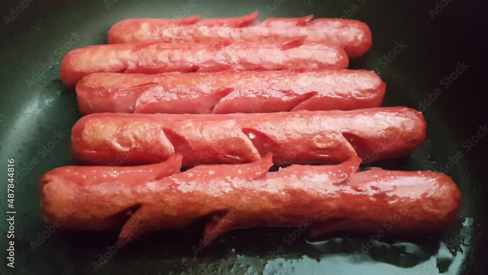 Video image of homemade hot dogs in the pot